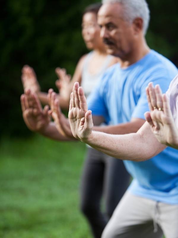 Groupe pratiquant le flow coaching, méthode de gestion du stress expliquée par Delphicoach Bulle